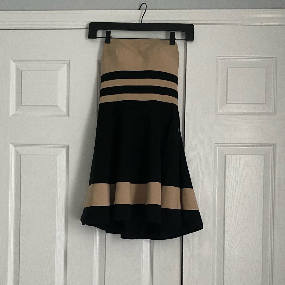 La Femme nude and black dress